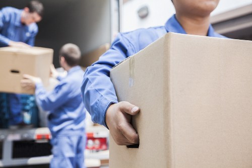 Packed moving boxes and household items ready for transport