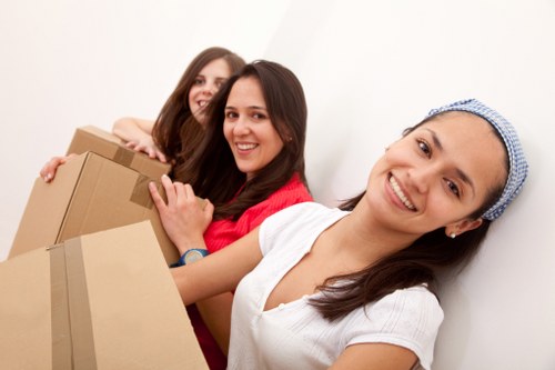 Commercial removals vehicle loading office equipment in Queensbury