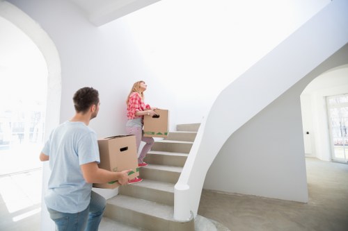 Moving van and organised furniture unloading at a local property