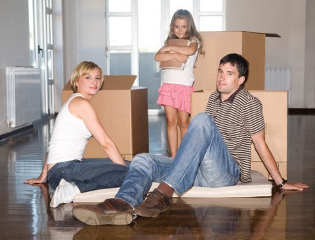 Unpacking and room setup service helping a family settle into a new Queensbury home
